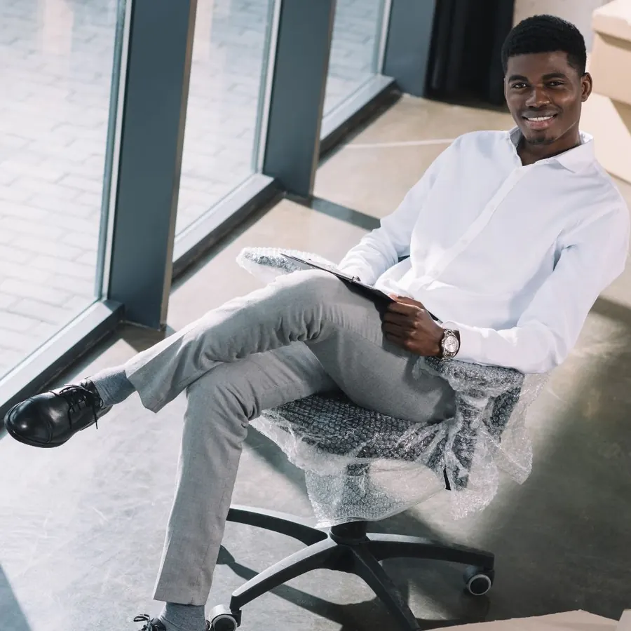 Client seated on a newly delivered office chair